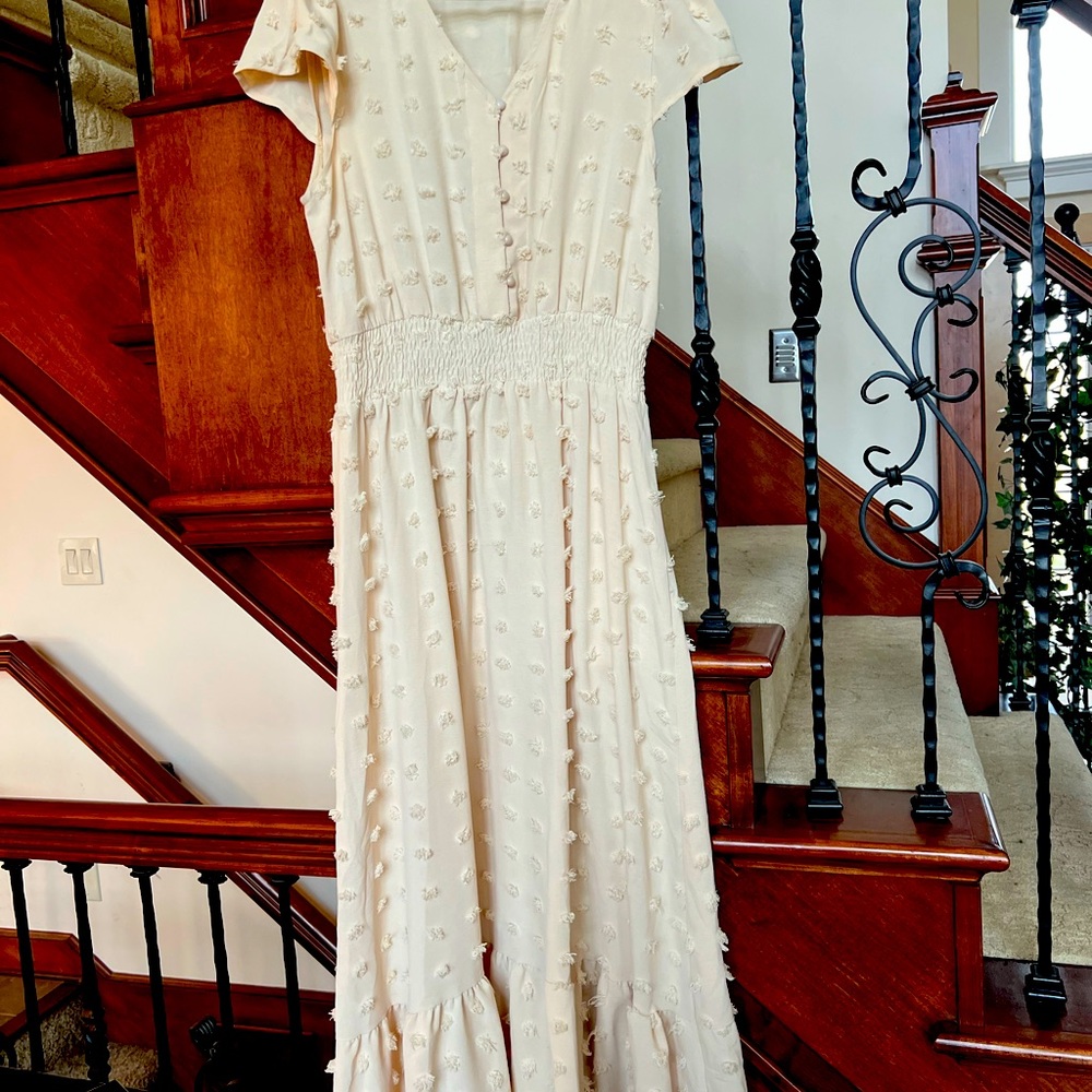 Women's long Cream dress.